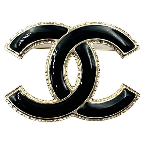 chanel brooch black and clear crystals cross|Chanel brooch price.